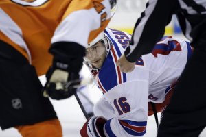 Derick Brassard takes a faceoff. AP/Matt Slocum