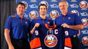 New Islanders captain John Tavares poses for a photo with coach Jack Capuano and GM Garth Snow. nhl.com