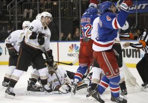 Mike Del Zotto and Carl Hagelin celebrate his first goal of the season. AP Photo/Kathy Willens