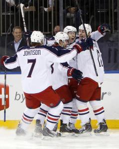 Matt Calvert and the Blue Jackets celebrate his goal 38 seconds in.  AP Photo/Jason DeCrow