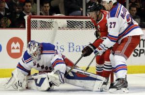 Henrik Lundqvist makes a stop on Jonathan Toews.  Getty Images/Nam Y. Huh