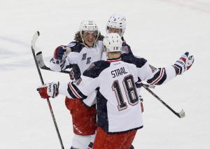 Ranger goal scorer Carl Hagelin is congratulated by Marc Staal during the second period at Yankee Stadium. Photos by Frank Franklin II/Getty Images