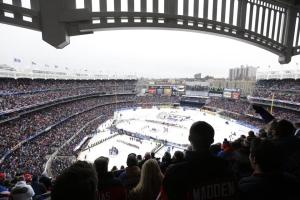 A Devil fan takes in the scene at Yankee Stadium.  Photos by Frank Franklin II/Getty Images