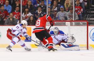 Henrik Lundqvist stops Jaromir Jagr on a breakaway en route to a Rangers franchise record 50th shutout. Ed Mulholland-USA Today Sports