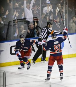 Brassy! Derick Brassard celebrates his overtime winner with Rick Nash. AP Photo by Frank Franklin II/Getty Images
