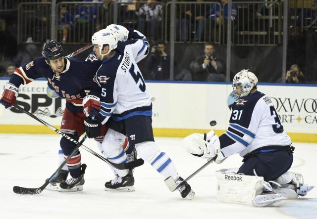 Tanner Glass battles Mark Stuart