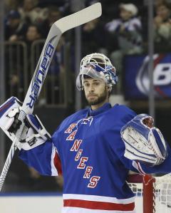 Cam Talbot acknowledges the home crowd after being selected 1st star during his shutout of the Canes. AP Photo by John Minchillo/Getty Images