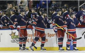 Brassy: Derick Brassard celebrates his power play goal with teammates at the bench.  AP Photo by Frank Franklin II/Getty Images 