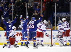 Islanders Celebrate: The Islanders celebrate Mikhail Grabovski's goal in the first. AP Photo by Kathy Willens/Getty Images