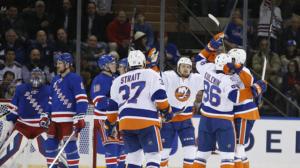 Isles' Celebrate: The Islanders celebrate Nikolay Kulemin's goal in a rousing 3-0 shutout of the Rangers at MSG. AP Photo by Kathy Willens/Getty Images