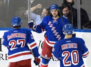 Zucc Celebrates: Mats Zuccarello is congratulated by Ryan McDonagh and Chris Kreider after his goal. AP Photo by Bill Kostroun/Getty Images
