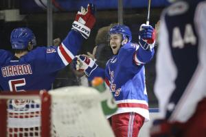 Stepan Up: Overtime hero Derek Stepan celebrates his winner with Dan Girardi.  AP Photo by John Minchillo/Getty Images