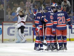 Can't Handle Yandle: Keith Yandle celebrates a goal in the first with Chris Kreider and Matt Hunwick. AP Photo by Frank Franklin II/Getty Images