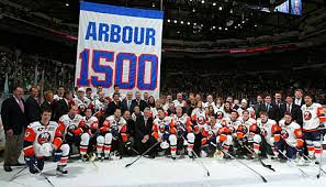 Al Arbour passed away at the age of 82 on Friday. He led the Islanders to four straight Stanley Cups and a sports record 19 consecutive playoff series wins.  usatoday30.com  Getty Images