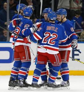 Keith Yandle celebrates a goal with teammates during the first period of a 6-2 win over the Stars. AP Photo/Julie Jacobson/Getty Images