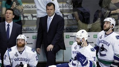 Newell Brown, Raffi Torres, Alain Vigneault, Chris Higgins, Tanner Glass